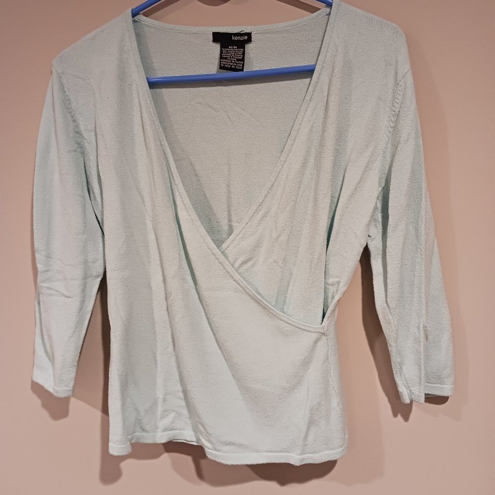 Light blue long sleeve deep vneck shirt